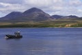 The Isle of Jura including the Paps (mountains) across the Sound of Islay, Scotland, UK Royalty Free Stock Photo