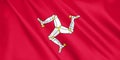 Isle of Man flag waving with the wind.