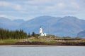 Isle Ornsay Lighthouse With Eilean Sionnach Lighthouse Cottage, Isle Of Skye. Royalty Free Stock Photo