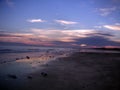 Isle of palms South Carolina sunset through the clouds with purple skies