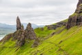 Isle of Skye - dramatic green highlands landscape with towering The Old Man of Storr rock formations and winding path through Royalty Free Stock Photo