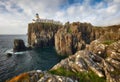 Isle of Skye lighthouse at Neist Point with beautiful golden light, beautiful landscape with sea - Scotland Royalty Free Stock Photo