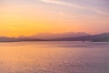 Isle of Skye Sunrise - golden sun glow on ocean, mountains and islands