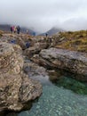 Isle of Skye, United Kingdom - 19 OCTOBER 2019 : Tourists enjoying refreshing view in Fairy Pools, Glen Brittle. Royalty Free Stock Photo