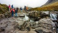 Isle of Skye, United Kingdom - 19 OCTOBER 2019 : Tourists enjoying view of Fairy Pools in Glen Brittle. Royalty Free Stock Photo