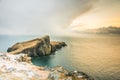 Isle of Skye winter landscape - Neist Point lighthouse and storm over ocean Royalty Free Stock Photo