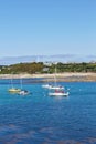 Isles of Scilly, United Kingdom - sailboats anchoring at Porthcressa Beach with Hugh Town in the background