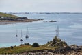 Isles of Scilly, United Kingdom - three sailboats anchor near St. MaryÂ´s harbor Royalty Free Stock Photo