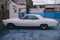 Vintage Retro 1965 White Buick Riviera GS in perfect conition parked on sunny day after the rain