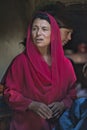 The village elders sit in the center of the house surrounded by the rest of the inhabitants and drink milk tea and bless the house