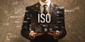 ISO with businessman holding a tablet computer Royalty Free Stock Photo