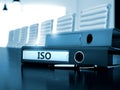 ISO on Office Binder. Toned Image. 3D. Royalty Free Stock Photo