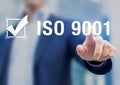 ISO 9001 quality management international standard organization certification with checkbox badge and businessman, certified Royalty Free Stock Photo