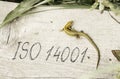 iso 14001 is shown on the conceptual photo using the text