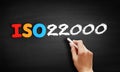 ISO 22000 standard text on blackboard