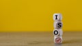 ISO standards verification, quality control certification approval. Cubes with the word ISO and a tick on a yellow background Royalty Free Stock Photo