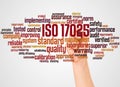 ISO 17025 word cloud and hand with marker concept Royalty Free Stock Photo