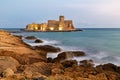 Isola di Capo Rizzuto. Calabria Italy. The Aragon castle at Le Castella at dusk Royalty Free Stock Photo