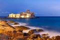 Isola di Capo Rizzuto. Calabria Italy. The Aragon castle at Le Castella at dusk Royalty Free Stock Photo