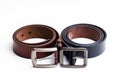 Isolate black and brown leather belt on white background Royalty Free Stock Photo