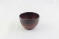 Isolate mini dark brown wooden cup on white background