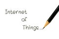 Isolate Pencil write the word Internet of Things on white Royalty Free Stock Photo