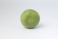 Isolate whole green lemon white backgroound Royalty Free Stock Photo