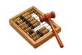 Isolate Wooden abacus with judge`s hammer for sentencing.