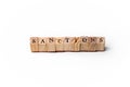 Isolate of wooden letters folded into the word sanctions