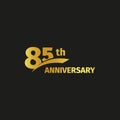 Isolated abstract golden 85th anniversary logo on black background. 85 number logotype. Eighty-five years jubilee