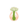 Isolated abstract natural logotype. Green color plant in human hands logo. Sprout in palms icon. Gardening sign. Growth