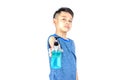 Isolated Alcohol gel bottles In the hands of asian boy on a white background with clipping path