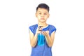 Isolated Alcohol gel bottles In the hands of asian boy on a white background with clipping path