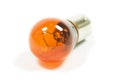 Isolated amber lightbulb Royalty Free Stock Photo