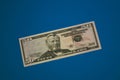 Isolated american fifty dollar bill on blue background Royalty Free Stock Photo