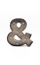 Isolated Ampersand with Light Bulbs and Wood Grain