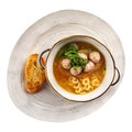 Isolated anelli soup with chicken meatballs Royalty Free Stock Photo
