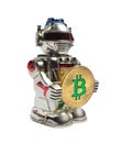 Robot toy with golden bitcoin currency.