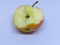 Isolated apple that has been bitten with a white background