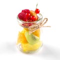Isolated assorted fruit mix in a glass jar Royalty Free Stock Photo