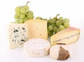 Isolated assortment of cheese and grape