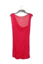 isolated asymmetrical red blouse is on clothes hanger