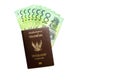 Isolated 100 Australian green cash money with Thai passport on white background. Royalty Free Stock Photo