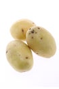 Isolated Australian potatoes. Cut raw potato vegetables isolated on white background with clipping path Royalty Free Stock Photo