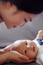 Isolated background Asia Chinese adorable cute toddler baby boy son child with his beloved mom mother maternal love nursing Royalty Free Stock Photo