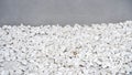 Isolated background of the white big pebbles and a wall Royalty Free Stock Photo