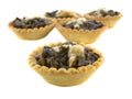 Isolated baked tartlets.