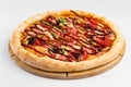 Isolated barbecue pizza with salami