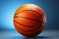 Isolated basketball on blue backdrop, offering room for personalized content