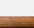 Isolated beautiful brown plank wooden table or desk on white background, little shiny surface, perspective view, empty space for Royalty Free Stock Photo